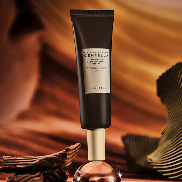 Сонцезахисна відновлювальна сироватка SKIN1004 Madagascar Centella Probio-cica Glow Sun Ampoule, 50 мл SK017 фото